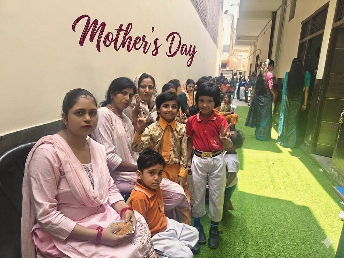 Mothers and children seated together at the centre